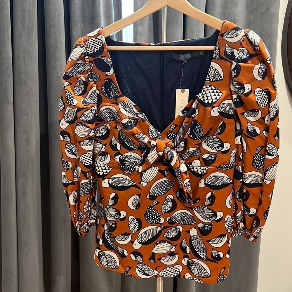 Eva Franco puff sleeve cut out top